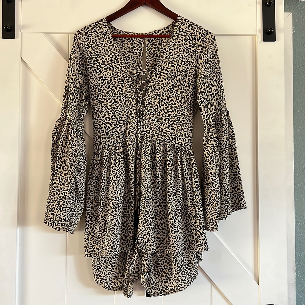 Leopard romper one size (more of a medium)